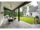 Outdoor patio with seating area, fireplace, and built-in grill at 1235 Mount Paran Nw Rd, Atlanta, GA 30327