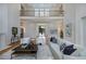 Open living room with hardwood floors, high ceilings, and a view to the dining area at 1235 Mount Paran Nw Rd, Atlanta, GA 30327