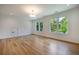 Spacious bedroom featuring hardwood floors and large windows at 1235 Mount Paran Nw Rd, Atlanta, GA 30327
