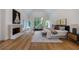 Luxurious main bedroom with hardwood floors, fireplace, and large windows at 1235 Mount Paran Nw Rd, Atlanta, GA 30327