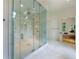 Large walk-in shower with built-in seating and marble surround at 1235 Mount Paran Nw Rd, Atlanta, GA 30327