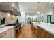 Modern kitchen features marble countertops and farm sink at 1235 Mount Paran Nw Rd, Atlanta, GA 30327