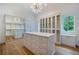 Spacious Primary closet with ample built-in shelving and drawers at 1235 Mount Paran Nw Rd, Atlanta, GA 30327