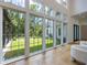 Bright living room with hardwood floors, high ceilings, and a view of the backyard at 1235 Mount Paran Nw Rd, Atlanta, GA 30327