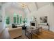 Relaxing living room with hardwood floors, fireplace, and ample natural light at 1235 Mount Paran Nw Rd, Atlanta, GA 30327