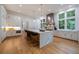 Large kitchen island with marble top and breakfast bar at 1235 Mount Paran Nw Rd, Atlanta, GA 30327