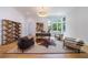 Bright home office with hardwood floors, large windows, and a stylish desk at 1235 Mount Paran Nw Rd, Atlanta, GA 30327