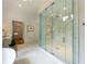 Spacious walk-in shower with multiple shower heads and marble tile at 1235 Mount Paran Nw Rd, Atlanta, GA 30327