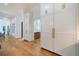 White kitchen cabinets with gold hardware and walk-in pantry at 1235 Mount Paran Nw Rd, Atlanta, GA 30327