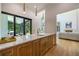 Modern wet bar with marble countertop and built-in cabinets at 1235 Mount Paran Nw Rd, Atlanta, GA 30327