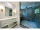 Spa-like bathroom with a frameless glass shower and marble tile at 1235 Mount Paran Nw Rd, Atlanta, GA 30327