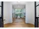 Bright entryway with hardwood floors and views into the living room at 1235 Mount Paran Nw Rd, Atlanta, GA 30327