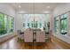 Open concept dining area with hardwood floors and natural light at 1235 Mount Paran Nw Rd, Atlanta, GA 30327