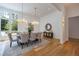 Elegant dining room with hardwood floors, a large table, and crystal chandeliers at 1235 Mount Paran Nw Rd, Atlanta, GA 30327
