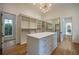 Bright walk-in closet with custom built-ins and mirrored doors at 1235 Mount Paran Nw Rd, Atlanta, GA 30327