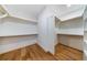 Spacious walk-in closets with ample shelving and hanging rods at 1235 Mount Paran Nw Rd, Atlanta, GA 30327