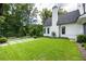 Landscaped backyard with lush lawn and a rectangular pool at 1235 Mount Paran Nw Rd, Atlanta, GA 30327