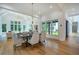 Bright dining room with hardwood floors and a view into the great room at 1235 Mount Paran Nw Rd, Atlanta, GA 30327