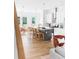 Modern kitchen with white cabinets, a large island, and stainless steel appliances at 597 Federal Se Ter, Atlanta, GA 30315