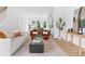Open living room with light and airy feel, featuring a neutral color palette and stylish furniture at 597 Federal Se Ter, Atlanta, GA 30315