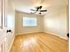 Bright bedroom with hardwood floors and ceiling fan at 1501 Clairmont Rd # 1917, Decatur, GA 30033