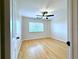 Spacious bedroom featuring hardwood floors and a ceiling fan at 1501 Clairmont Rd # 1917, Decatur, GA 30033