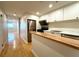Modern kitchen with stainless steel appliances and light wood countertops at 1501 Clairmont Rd # 1917, Decatur, GA 30033