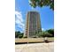 High rise building exterior with balconies and parking area at 1501 Clairmont Rd # 1917, Decatur, GA 30033
