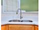 Modern kitchen sink with quartz countertop and stainless steel faucet at 2015 Ridgestone Sw Lndg, Marietta, GA 30008