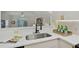 Kitchen sink with a black gooseneck faucet and white quartz countertops at 4254 River Green Nw Dr # 616, Atlanta, GA 30327
