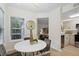 Modern dining area with kitchen view at 4254 River Green Nw Dr # 616, Atlanta, GA 30327