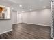 Bright living room featuring wood-look floors and recessed lighting at 3599 Woodbriar Cir # E, Tucker, GA 30084