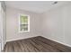 Bright bedroom with wood-look floors and ample closet space at 3599 Woodbriar Cir # E, Tucker, GA 30084