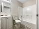 Clean bathroom, featuring a bathtub and vanity with mirror at 101 Dodd St, Fairburn, GA 30213