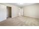 Main bedroom with walk-in closet and carpet flooring at 101 Dodd St, Fairburn, GA 30213