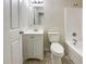 Clean bathroom with white vanity, toilet, and bathtub at 101 Dodd St, Fairburn, GA 30213