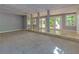 Bright, open basement with access to backyard patio at 3125 Lakeside Dr, Cumming, GA 30041