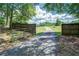 Long private driveway leading to a spacious property at 58 S Broad St, Porterdale, GA 30014