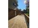 Deck overlooks backyard and additional structure at 4670 Eberline Ct, Stone Mountain, GA 30083