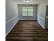 Bright dining room with hardwood floors and neutral walls at 4670 Eberline Ct, Stone Mountain, GA 30083