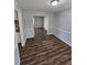 Bright dining room with hardwood floors and view to living room at 4670 Eberline Ct, Stone Mountain, GA 30083