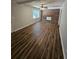Spacious living room with hardwood floors and brick fireplace at 4670 Eberline Ct, Stone Mountain, GA 30083