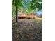 Back of house showing deck and yard at 4670 Eberline Ct, Stone Mountain, GA 30083