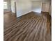 Spacious living room with hardwood floors and large windows at 4670 Eberline Ct, Stone Mountain, GA 30083