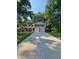 Two-story house with attached garage and a well-manicured lawn at 4670 Eberline Ct, Stone Mountain, GA 30083