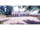 Large backyard showcasing a home's back elevation at 221 Bridgemill Ln, Hampton, GA 30228