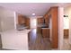 Modern kitchen with island and hardwood floor at 221 Bridgemill Ln, Hampton, GA 30228