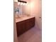 Elegant double vanity bathroom with marble countertop at 221 Bridgemill Ln, Hampton, GA 30228