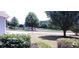 Community view with playground and trees at 221 Bridgemill Ln, Hampton, GA 30228