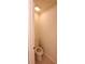 Convenient half bathroom with single toilet and pedestal sink at 221 Bridgemill Ln, Hampton, GA 30228